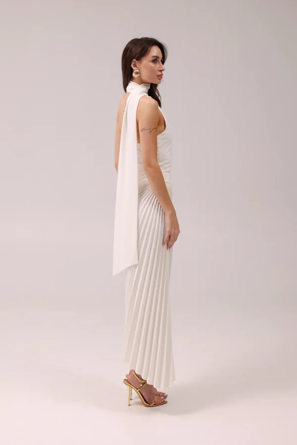 Flowing asymmetrical skirt for beach dinners and luxury holidays by REPULO’S