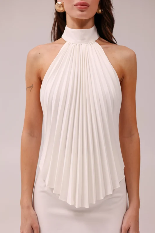 Luxury backless halter top for yacht parties by REPULO’S