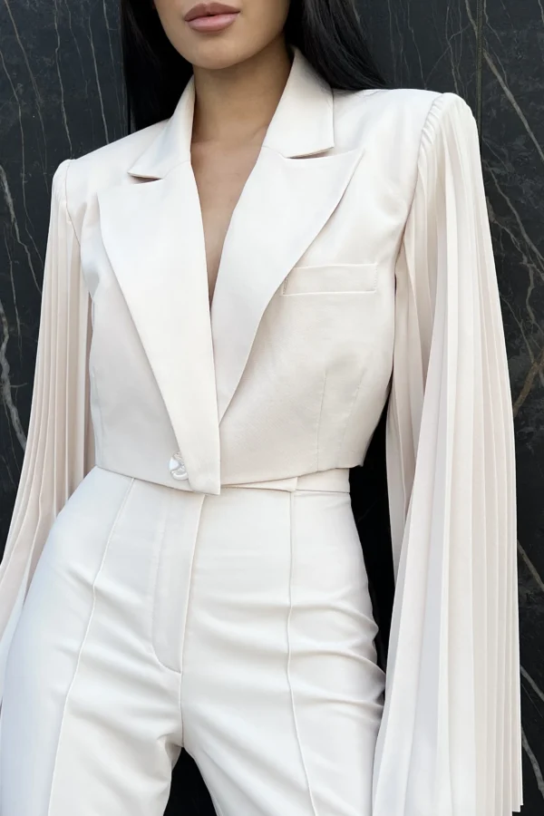 Designer cropped jacket with architectural tailoring by REPULO’S