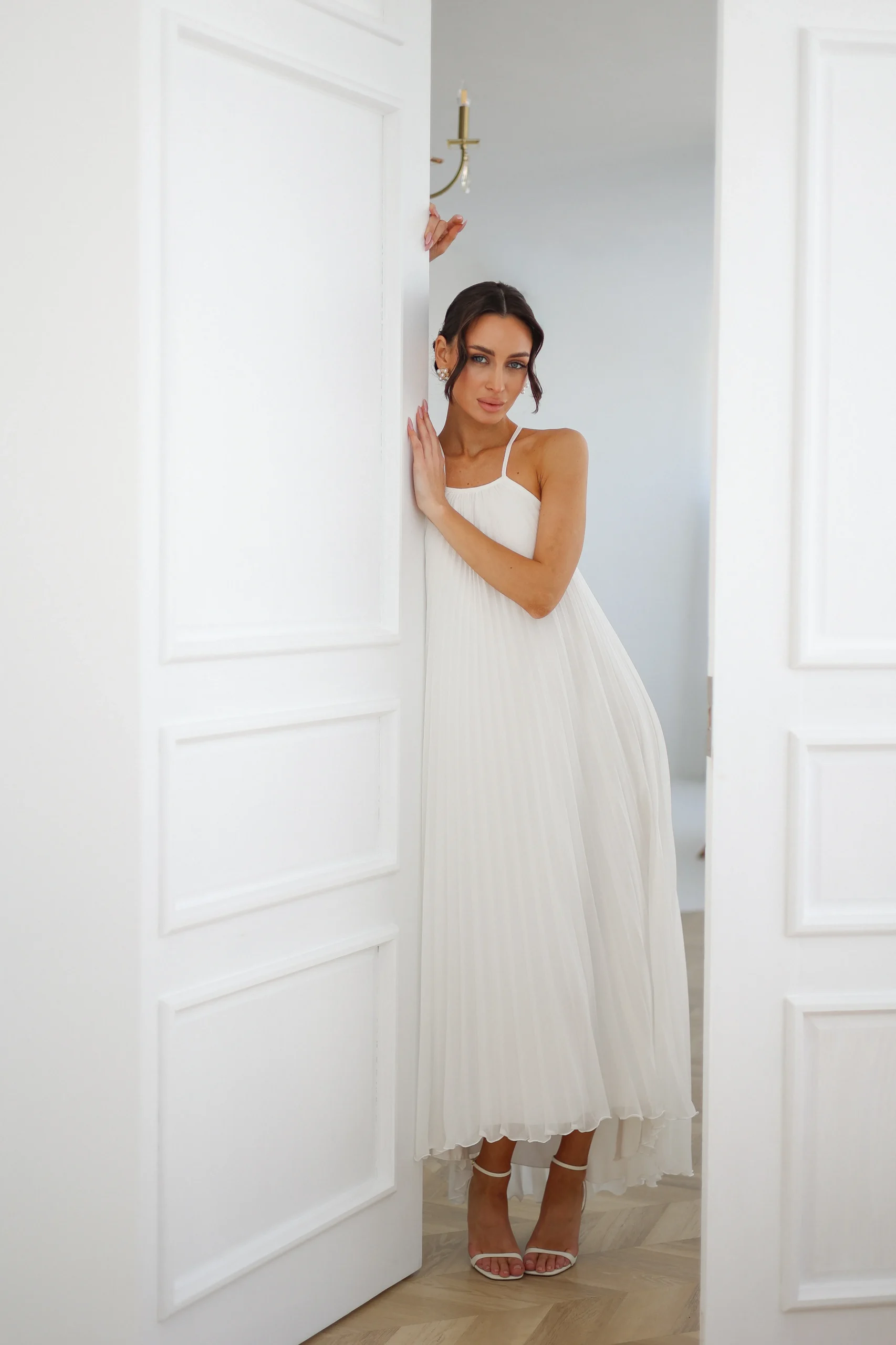 Backless pleated chiffon dress for honeymoon and maternity celebrations by REPULO’S