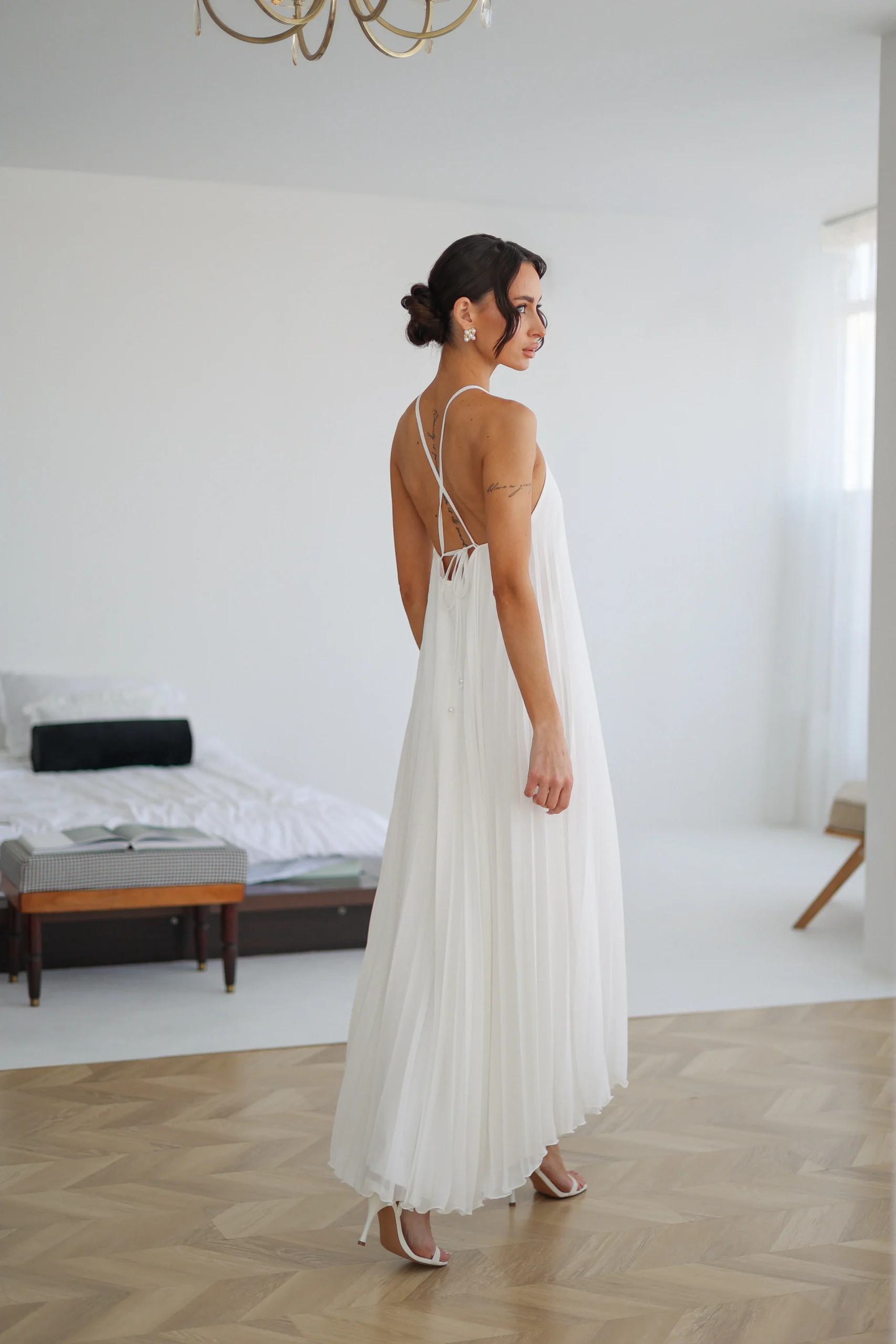 Women’s elegant backless dress for beach wedding celebrations by REPULO’S