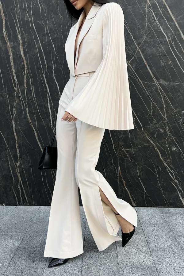 Luxury statement trousers with knee-high side slits by REPULO’S