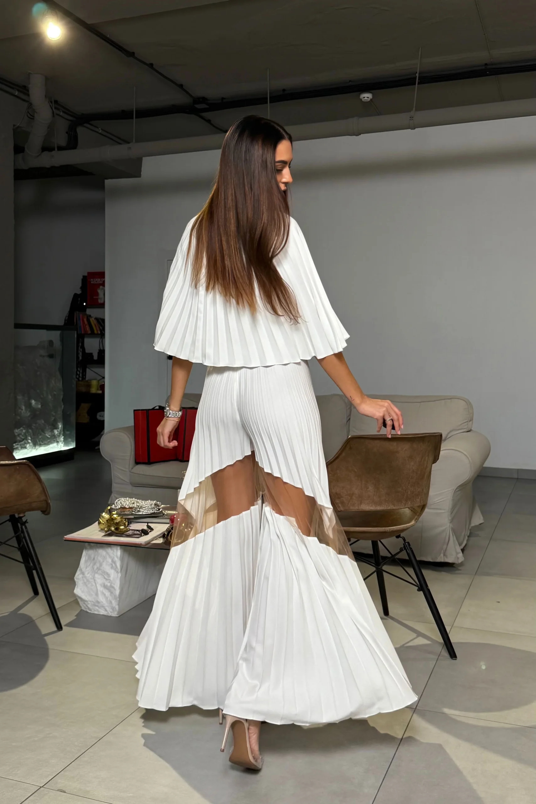 Pleated wide-leg pants with sheer mesh detailing by REPULO’S - in a move
