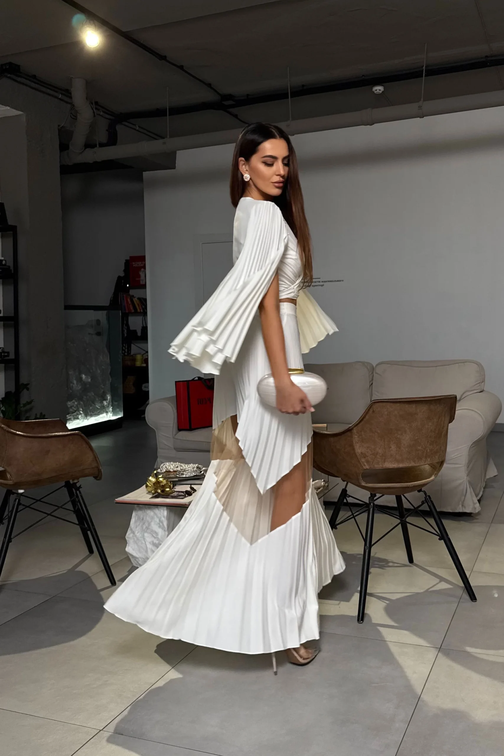 Women’s wrap blouse with flowing pleated sleeves by REPULO’S