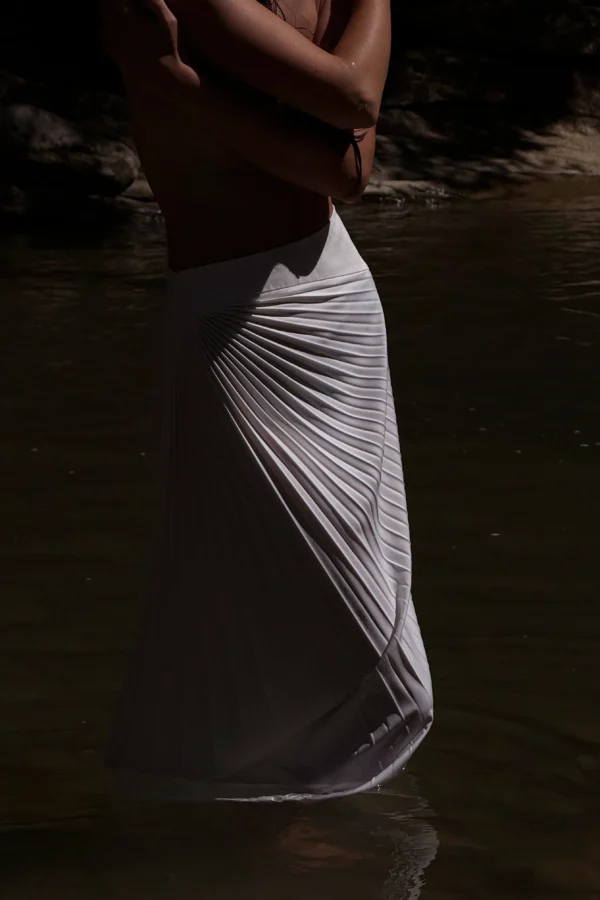 Elegant asymmetrical pleated skirt for modern women’s wardrobes by REPULO’S