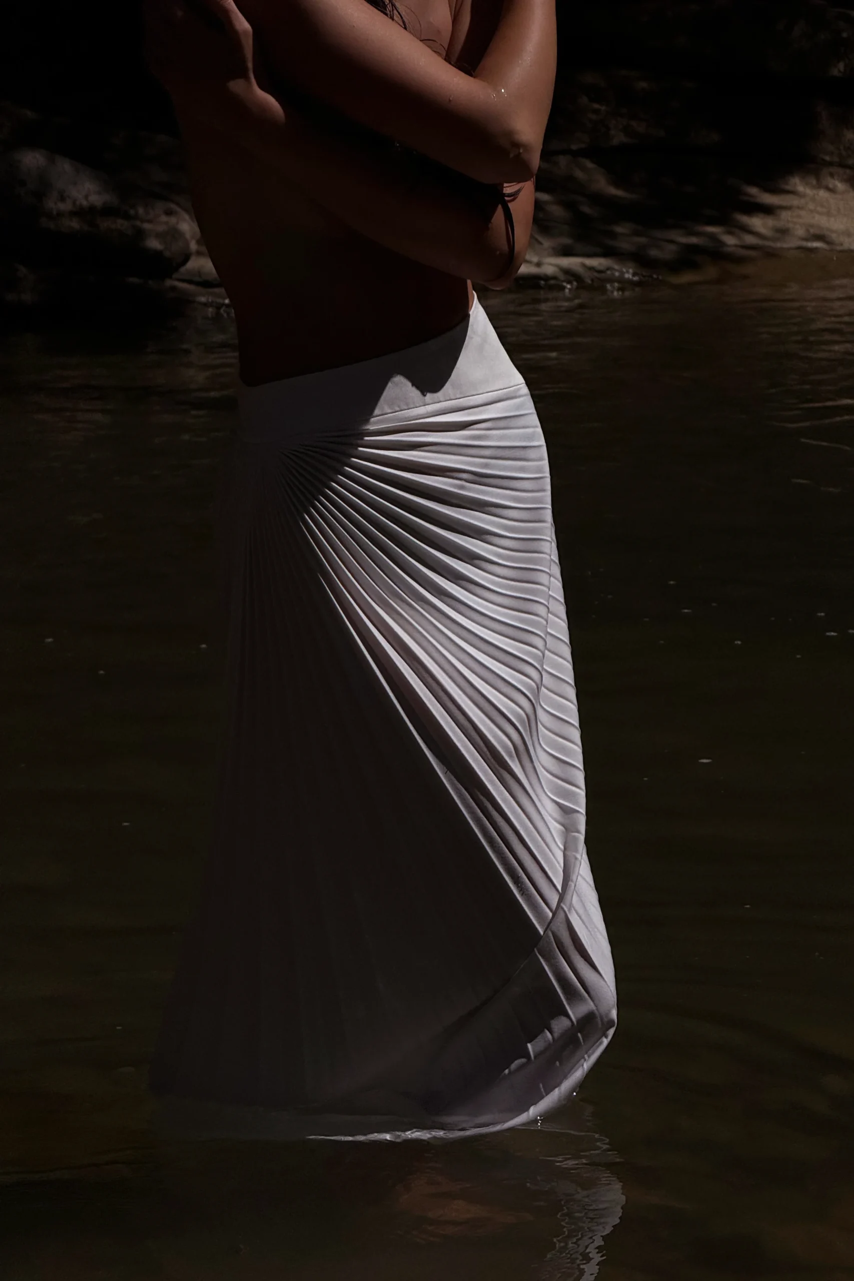 Elegant asymmetrical pleated skirt for modern women’s wardrobes by REPULO’S