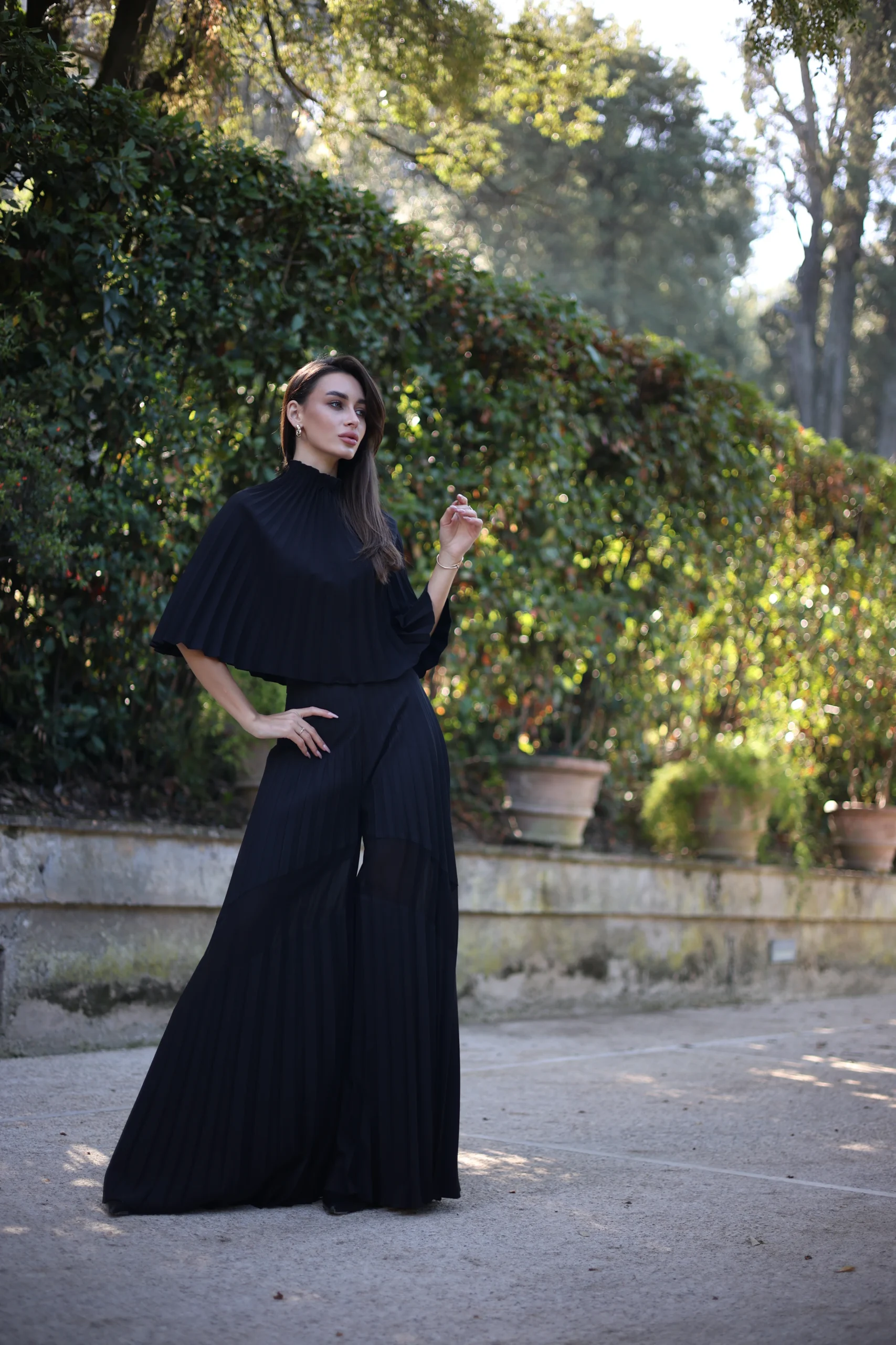 Pleated turtleneck black cape for sophisticated layering by REPULO’S