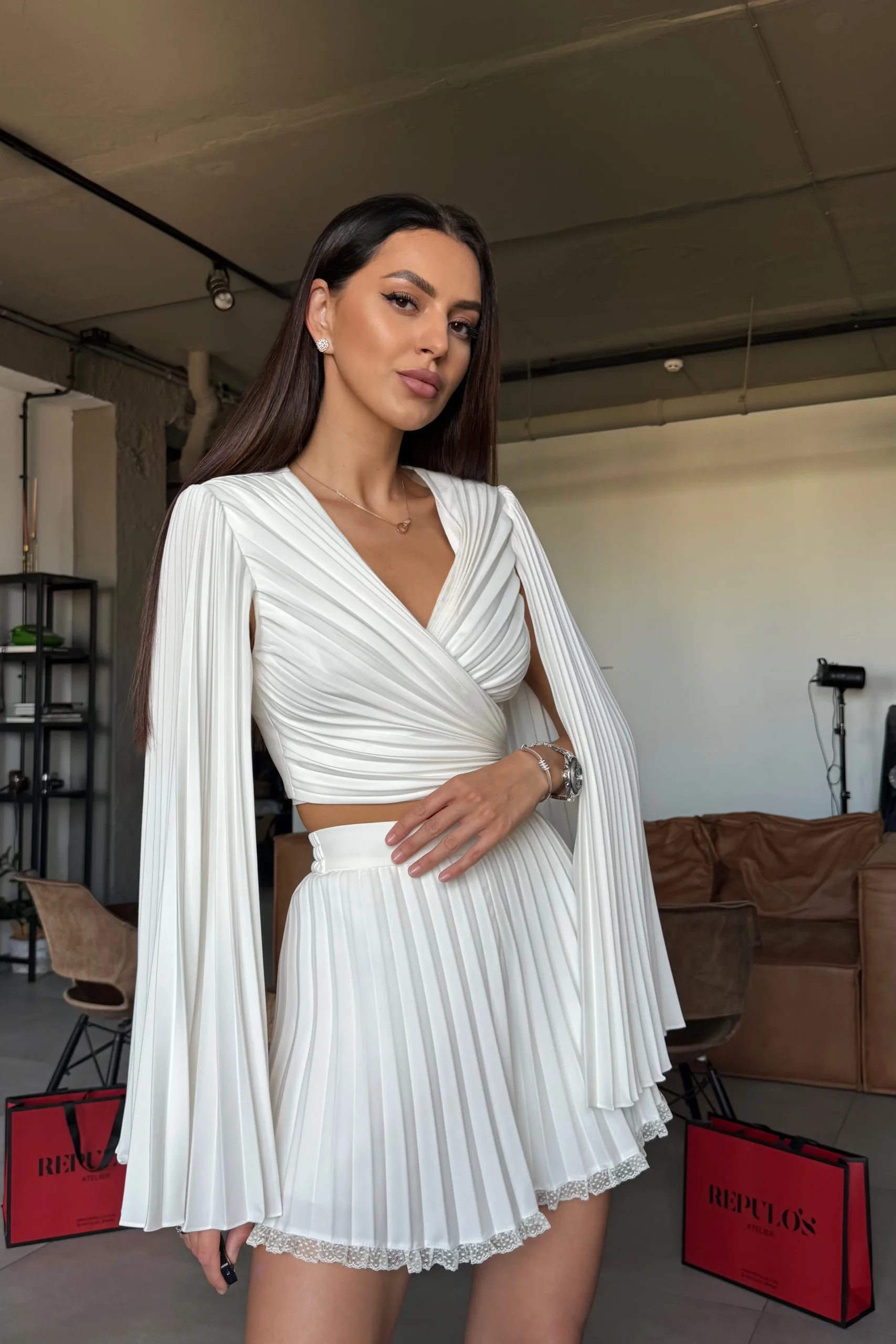 Designer pleated shorts for European summer and honeymoon outfits by REPULO’S