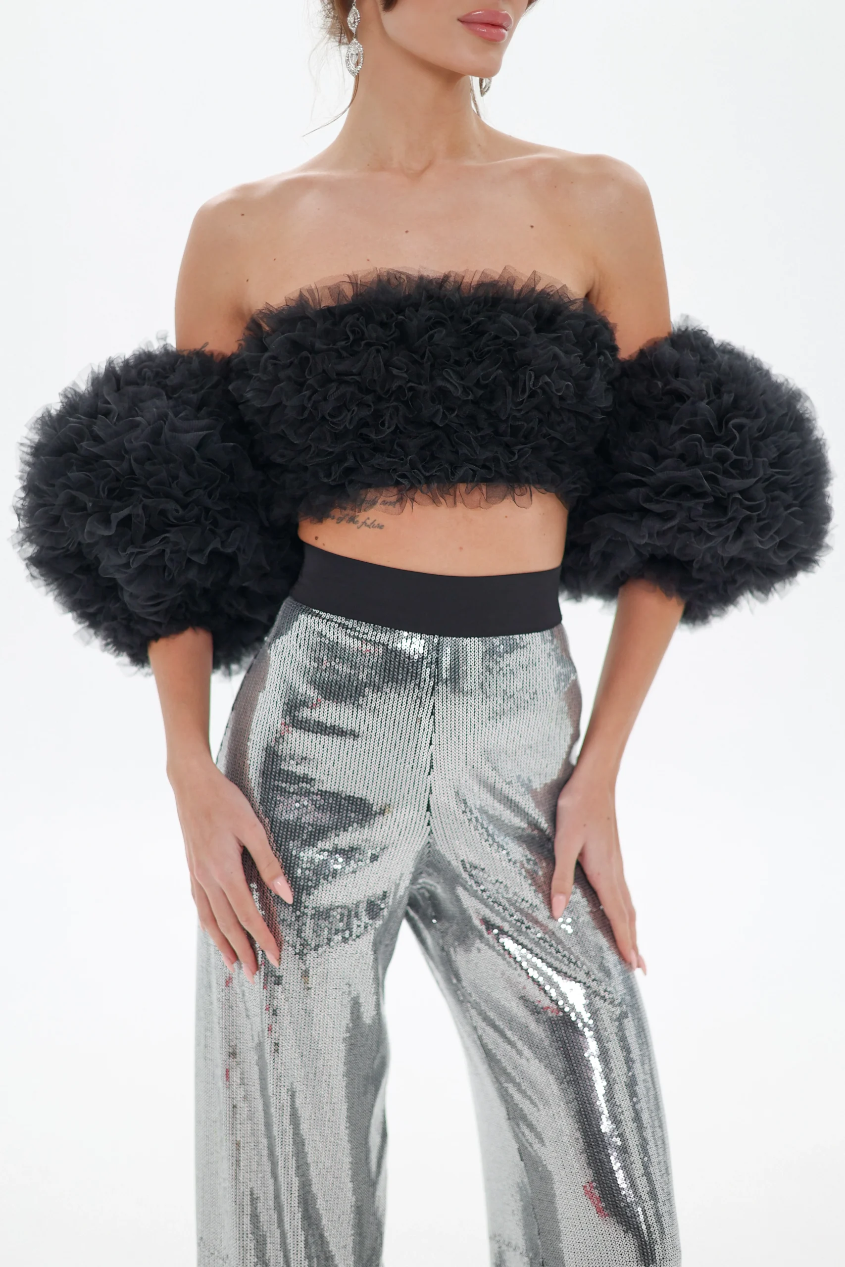 Close-up of the black tulle bubble sleeves on the bandeau top