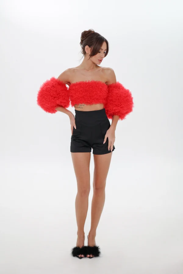 Full-length look with the red Cloud top and detachable sleeves