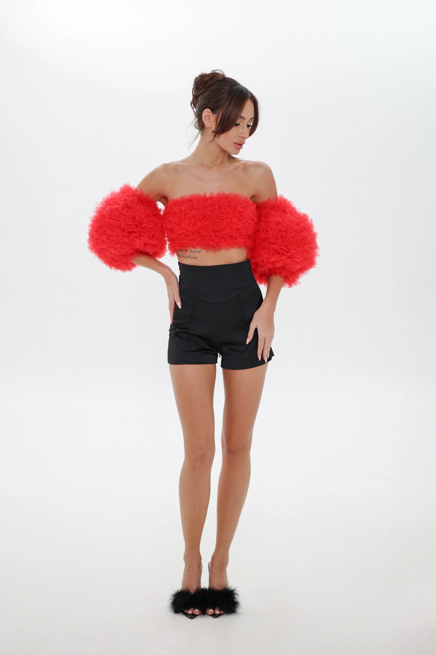 Full-length look with the red Cloud top and detachable sleeves