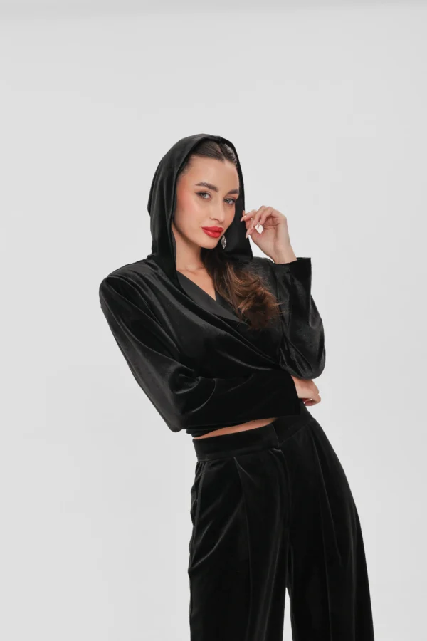 Cropped velvet top with long sleeves and the hood up, three-quarter view by REPULO’S