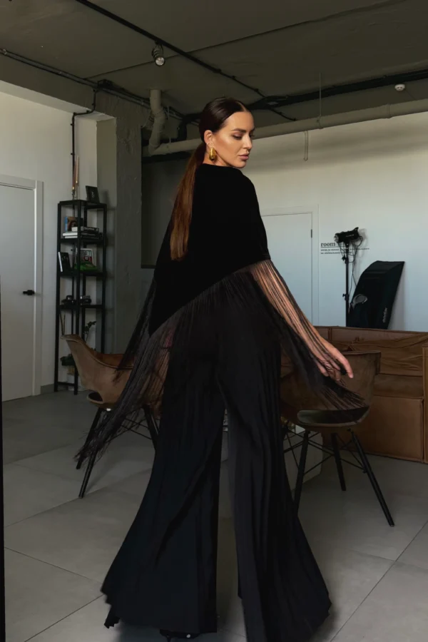 Large black velvet triangle scarf worn over a dress, REPULO’S